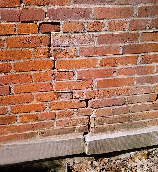 Crack in brick wall, close up