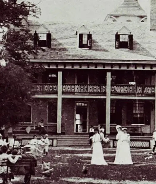 Vintage photograph of large white mansion