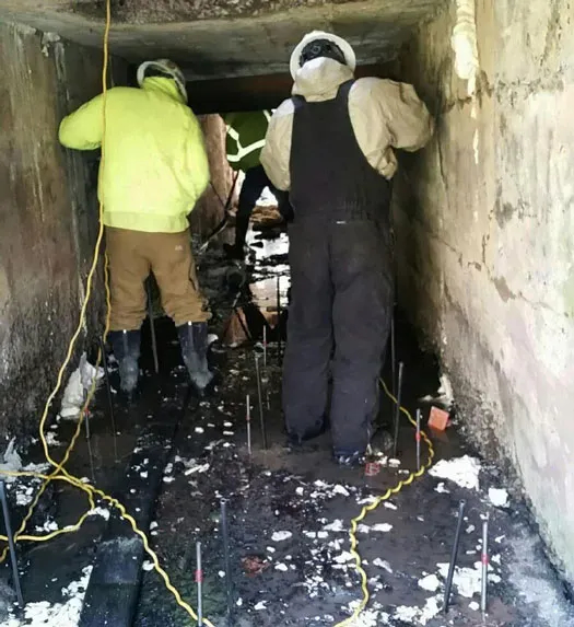 URETEK technicians at work on culvert
