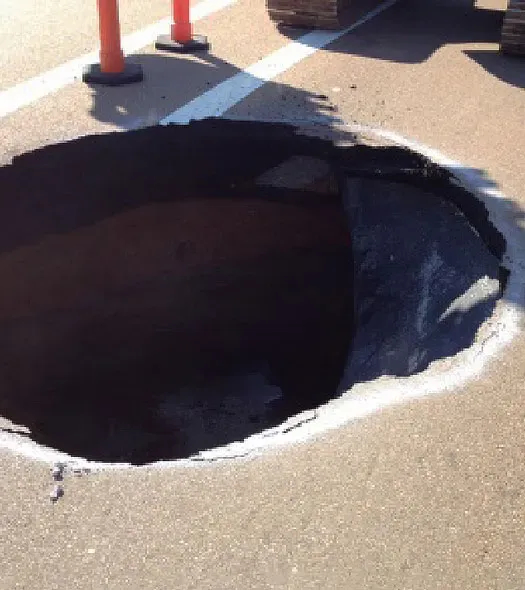 Large sinkhole in roadway