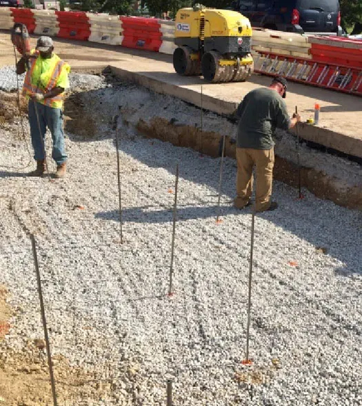 Technicians prepare sinkhole for repair