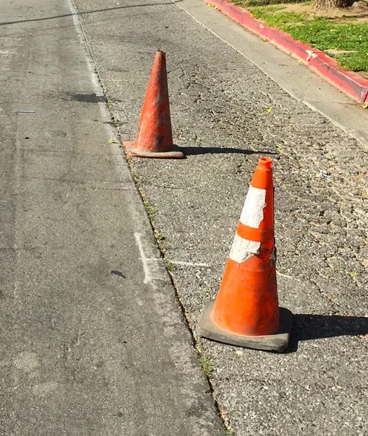 Two construction cones on roadway
