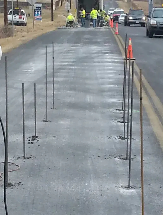 Tubes installed in array in roadway