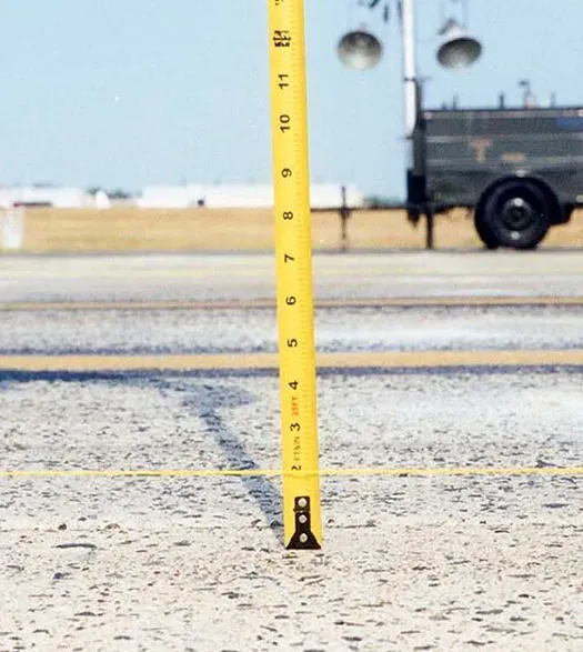 Tape measure next to highway