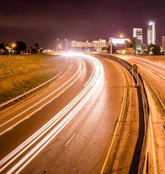 Highway with white lights streaking