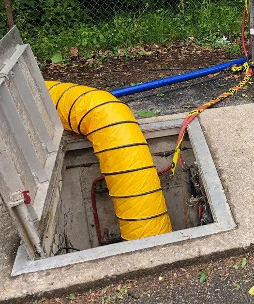 Yellow tube emerging from hatch